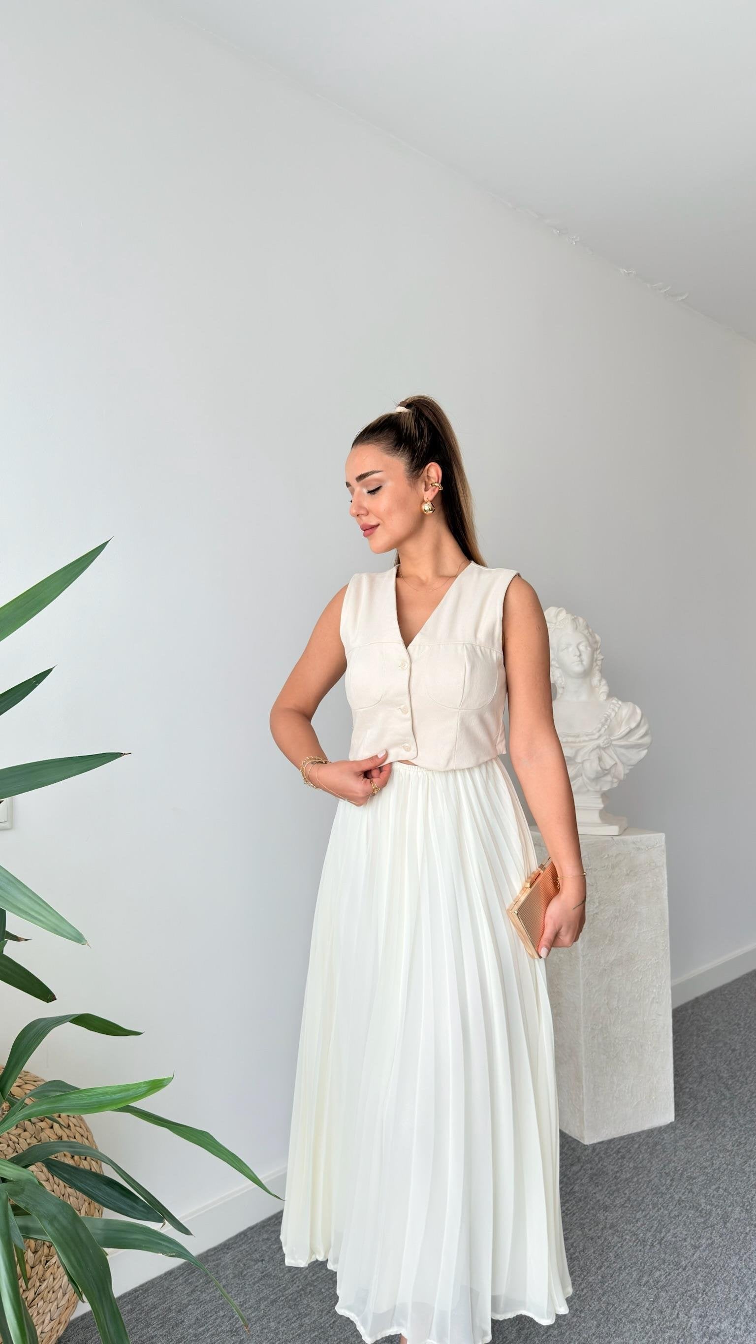 Brand Model Pleated Cream Dress with Vest Detail